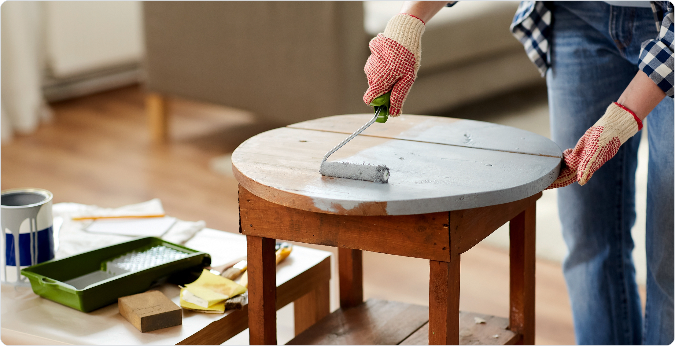 Person refinishing furniture